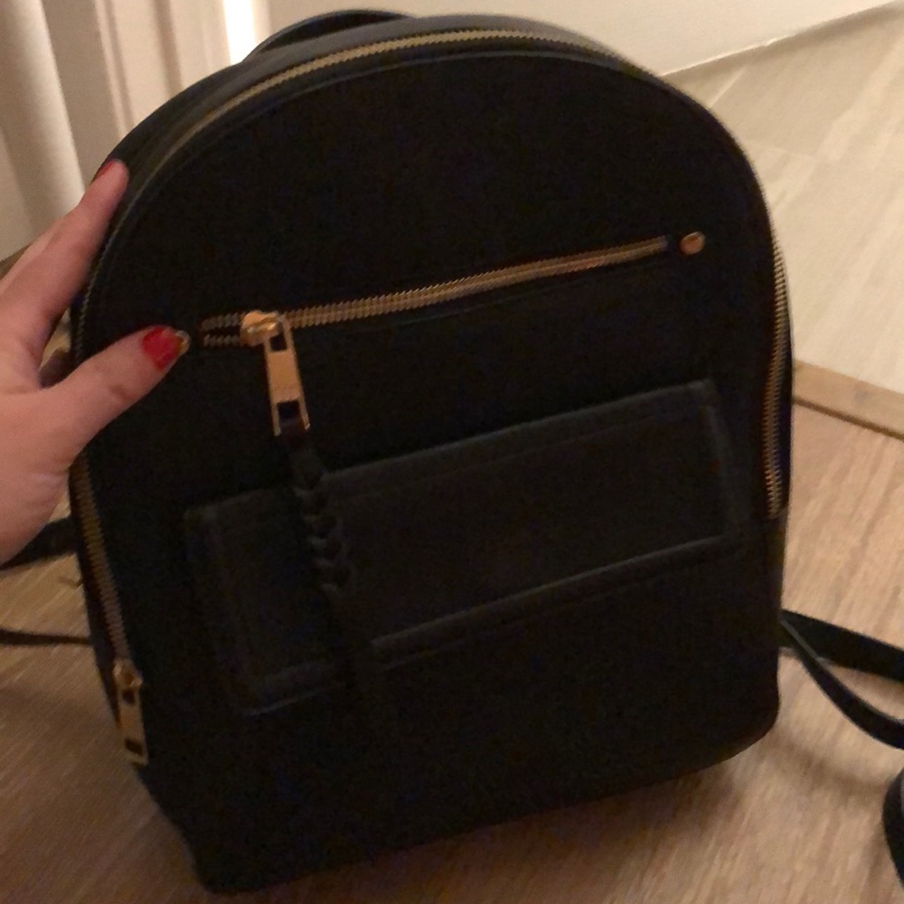 Gap black backpack w/ gold zipper